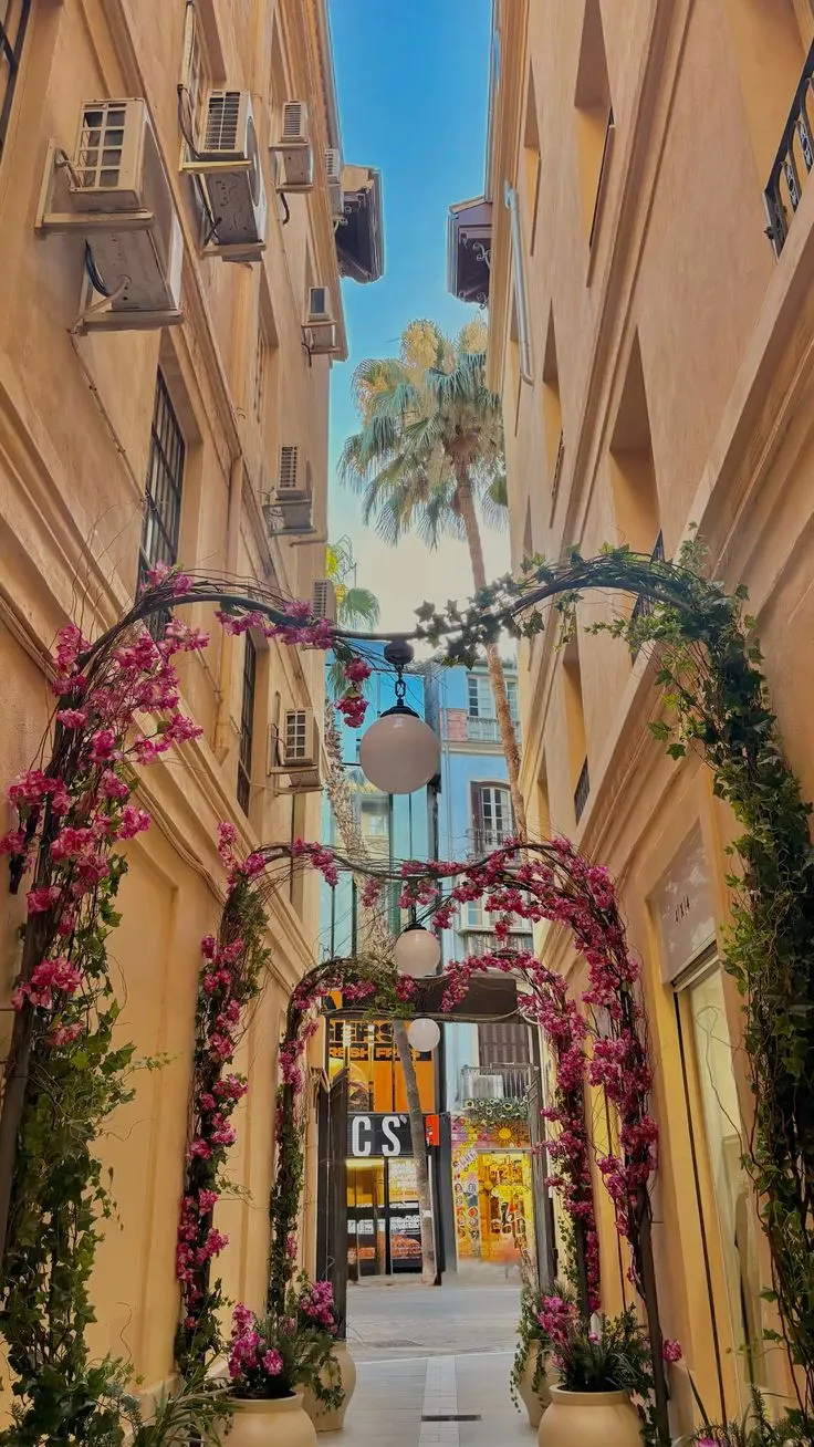 A flower-draped alley in the old town